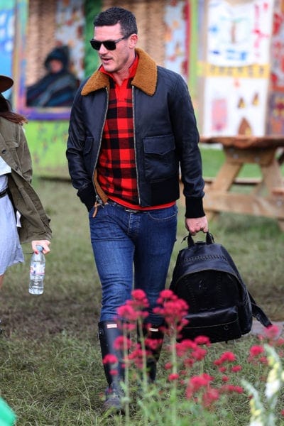 Luke Evans wearing Coach Fall 2016 at Glastonbury Festiva