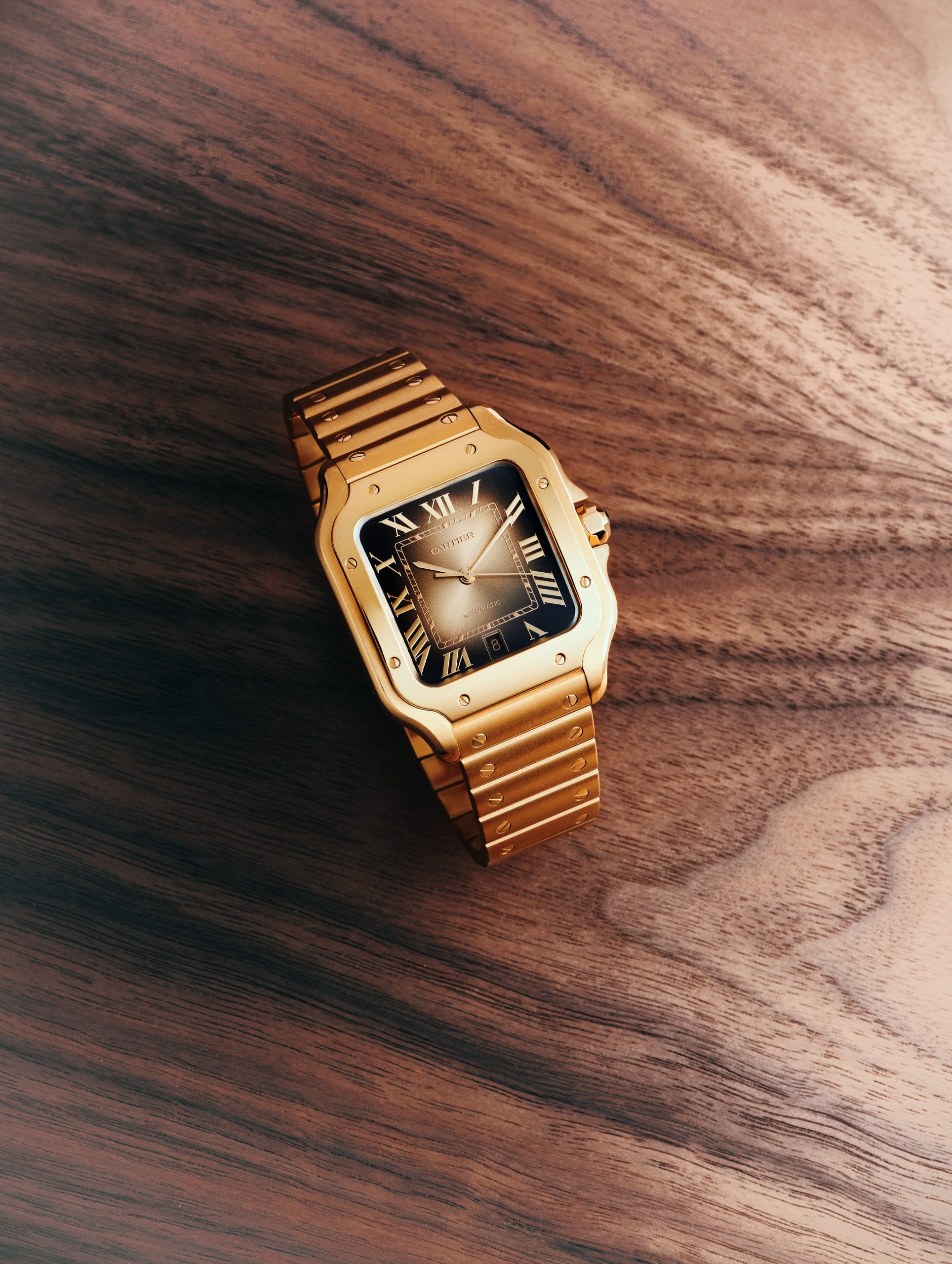 The Santos de Cartier Glows in A Cinematic Gold The Santos de Cartier Glows in A Cinematic Gold